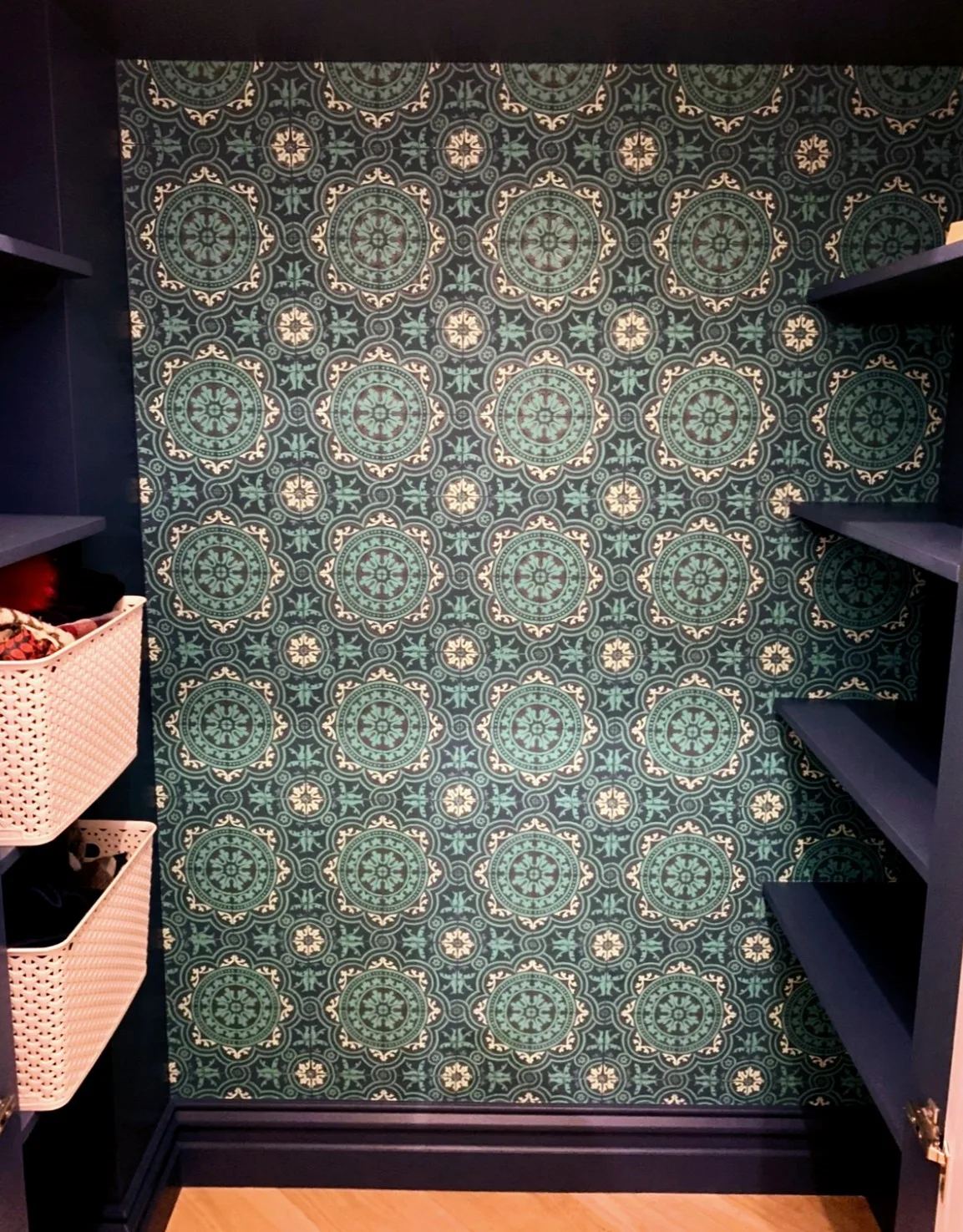 Ornate teal tiles with intricate golden geometric patterns