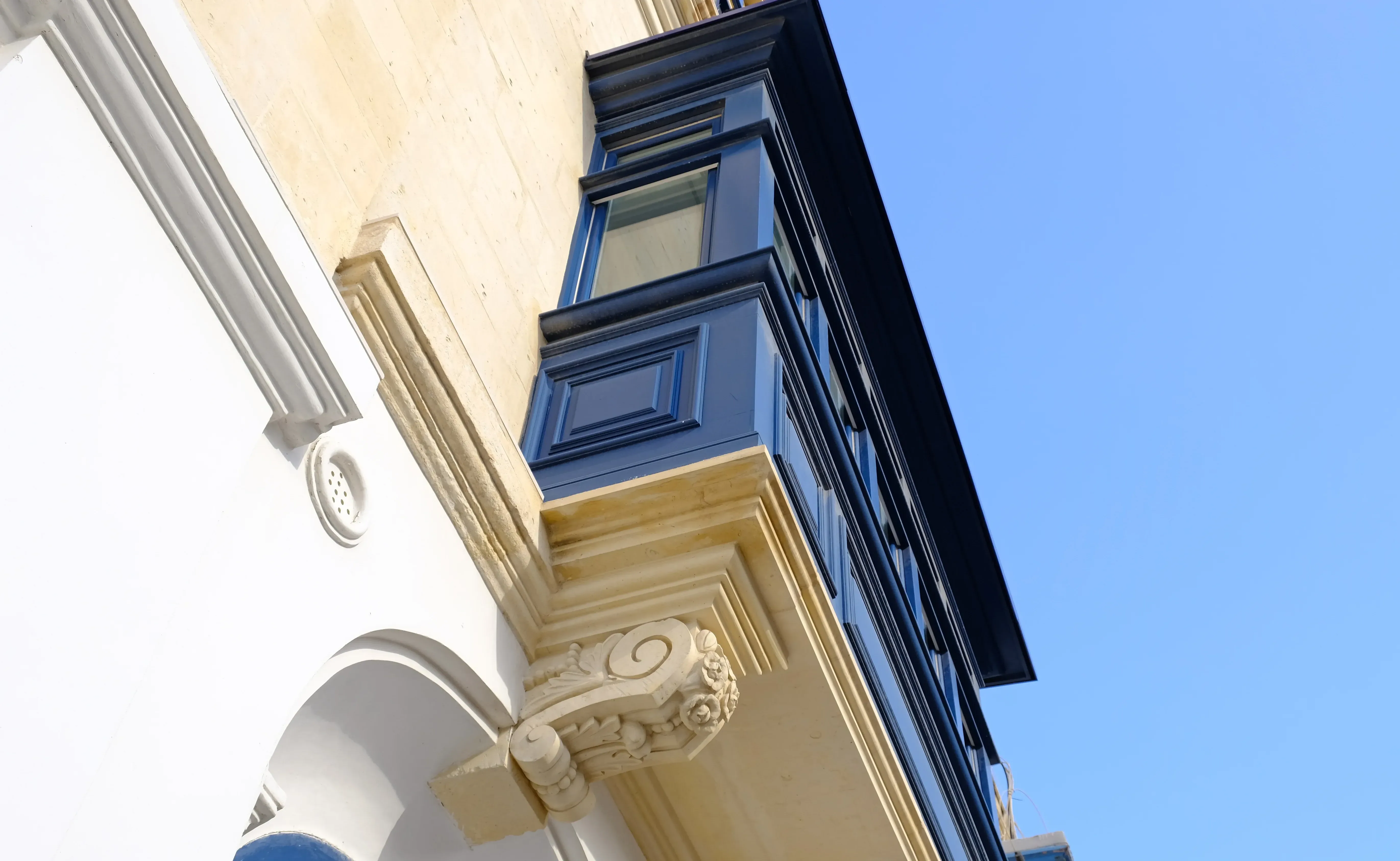 Exterior wall painting showcasing ornate detailing and clean lines